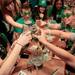 A group of friends commence a toast at the Brown Jug in Ann Arbor on St. Patrick's Day. Chris Asadian | AnnArbor.com